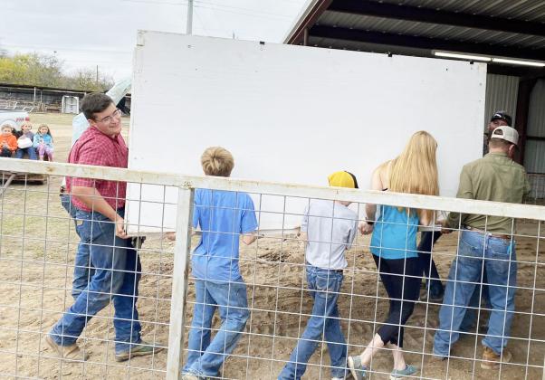 TEAMWORK- Is what makes it happen at the Murchison/Whitehead youth complex in Menard. 4-H exhibitors were required to attend one of two barn clean-up work days in preparation for the 91st Annual Menard County Junior Livestock &amp; Youth Show -and sale- to be held this weekend. Menard County 4-H members will compete in everything from the rabbit show to baking, and swine to sewing projects starting Thursday evening, December 15. More details available on the front page. Courtesy photo.