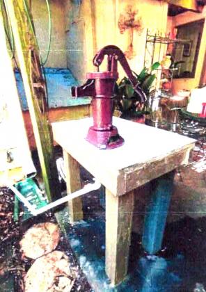 ABOVE- The emergency water well set up at the Menzies household.