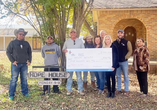A DONATION FOR THE SEASON- Menard County Farm Bureau presented a donation check to the Hope House food pantry this week. Pictured left to right- Cody Swindall, Farm Bureau (FB); Hope House (HH) volunteer; Tyson Roll, FB; Charlie Goode, HH; Bobbie Jo Hartwick, HH; Bill Swope HH; Melanie Cruz, HH; Zach Nash, FB; Mary Chavez, HH. Courtesy photo.