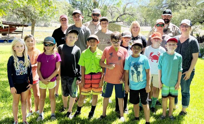 4-H members enjoy a fun-filled day of learning and fishing