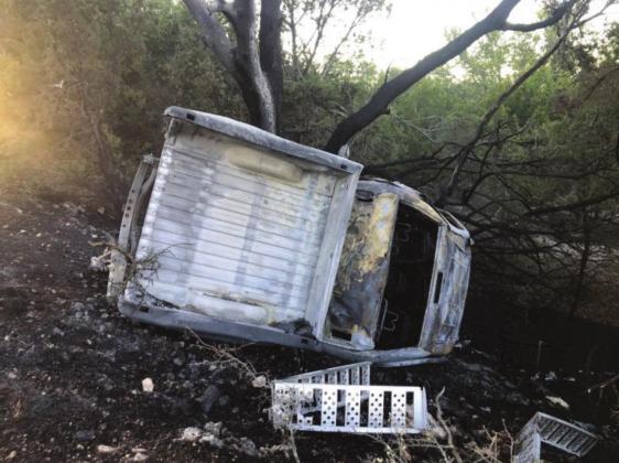 A late-model Chevrolet Silverado pickup suffered a blown tire on Hwy 29 on Thursday, September 16, 2021. The vehicle left the roadway, and rolled. It was fully engulfed in flames when first responders arrived. The driver and 2 other occupants were each transported for medical care. Photo courtesy Menard County Sheriff’s Office.