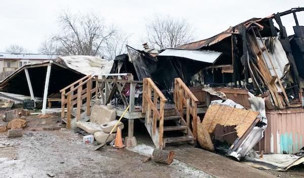 ALL THAT REMAINS of the mobile home that caught fire in the early morning hours of Wednesday, February 1, 2023. The young family was able to escape uninjured; however their home was a total loss. Photo courtesy Menard VFD.