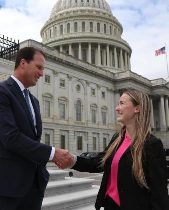 Left:Congressman August Pfluger with Madelon Clark mark the end of Clark’s D.C. office internship with a handshake in front of the U.S. Capital.Courtesy