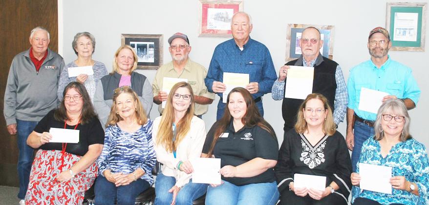 Menard Branch 161 Hochheim Prairie Insurance presents checks