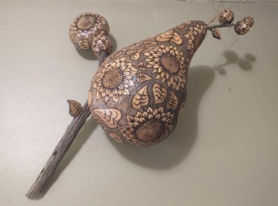 “Sunflowers in Bloom,” pictured above, is just one of the many pieces local, award winning, gourd artist Marcy Holmes-Wheeler created and will have on display in Fredericksburg. Courtesy Photo.
