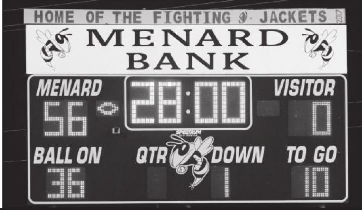 Left-The winning scoreboard shot! It’s been a while since the ‘Jackets racked up 56 points and shut out the opposing team! Photo by Nora Davis.