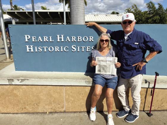 ALOHA- Buffy and David Powell recently traveled to Hawaii and were thoughtful enough to take The Menard News along, as shown here at their visit to the Pearl Harbor Historic sites. Looks like a great trip, thanks for thinking of us, Powells! Courtesy photo.