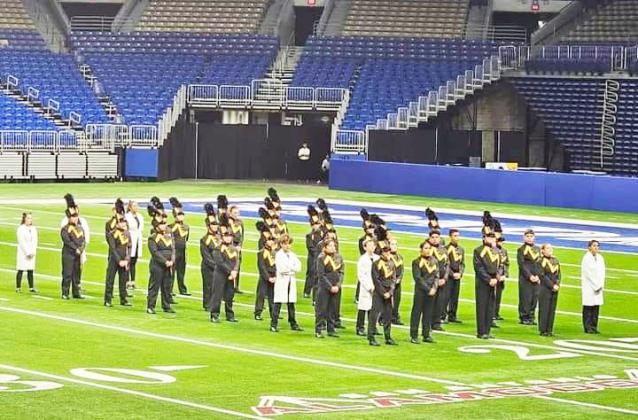 Menard’s band positioned on the field at the Alamodome, awaiting the results announcement.