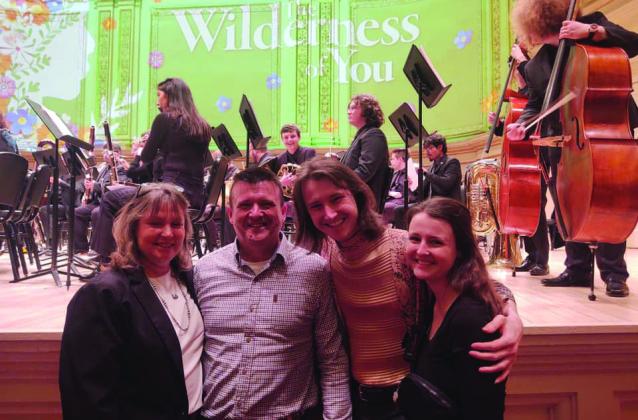A FAMILY AFFAIR- Roy Brown (back center) on the Carnegie Hall stage before the WT A&amp;M Symphonic Band performance. Parents Lisa and Mike Brown, brother Chris Brown, and sister Danielle Brown were all in attendance for the once in a lifetime opportunity. Courtesy photo.