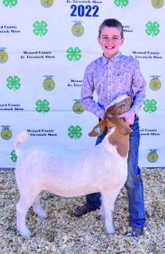 Kallan Wright and his 3rd place heavy weight market goat.