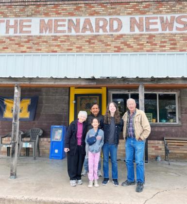 The Dan Feather Jr. and III families enjoyed a spring break visit in Menard. They took the time to snap a photo in front of the former family enterprise. Pictured, left to right is Cindy Feather; Dan Feather, III; Lily Feather, Dan Feather, Jr. Up front is Miss Brette Feather.