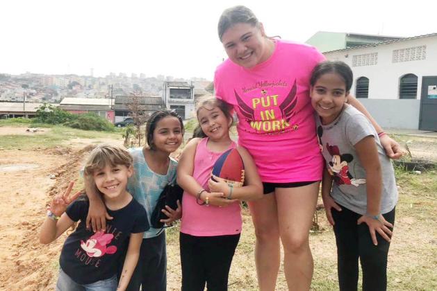 Kristen Portilla enjoyed a previous mission trip to Brazil, pictured above, and is raising funds for her next mission adventure this summer. Kristen is a successful and involved senior at Menard High School. Courtesy photo.
