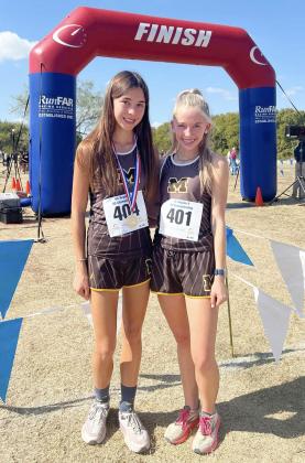 MOVIN' ON- Sophomore Danni Ruiz, left, and freshman Taytum Chambless, right, have both qualified to compete in the state cross country meet in Round Rock on November 2. Ruiz placed second at the regional meet and Chambless was thirteenth. Way to work, girls, and good luck at state! Courtesy photo.