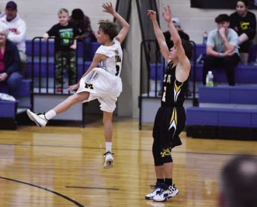 ABOVE- Freshman JV Jacket Jaegar Leonard leaps to intercept a Paint Rock pass at a home game this past Tuesday. Madolyn Nasworthy, photo.