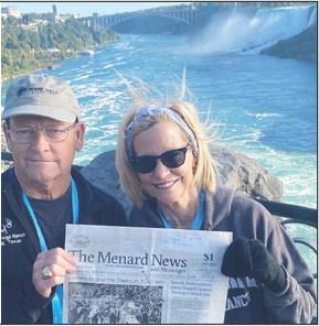 THE NEWS ON THE MOVE- Menard natives Lee Murchison and Beth Ann Erhardt recently thought to take along their Menard News newspaper on a trip to Niagra Falls. Photo by Danette Murchison.
