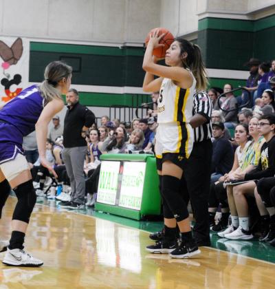 LEFT- Senior Jalyn Montes inbounds the ball during the Lady Jackets loss to Irion County in the first round of playoffs. Jalyn is the only senior the team will lose this year. Photo by Sandy Kothmann.