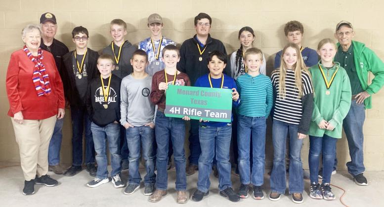 MENARD COUNTY RIFLES COMPETITORS- front row, left to right: O'Dan Wright, Logan Kumamoto, Kallan Wright, Trevor Mazac, Roy Mews, Taytum Chambless, Caitlyn Burch. Back row: Guest-of Honor Betty Jackson, Coach Terry Kelley, Jackson Thigpen, Benjamin Burch, Wesley Compton, Larkin Loeffler, Mia Estrada, Maddock Murr, coach David Hand. TMN photo.