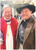 Rev. Reed, left; Father Roque, right.