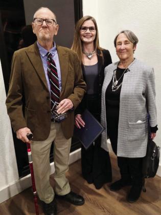 Dr. Dale Hancock, left, was presented with the Boys & Girls Clubs of the Concho Valley's C.A.R.E. Award at an annual meeting last week. Dr. Dale was chosen for the honor, which stands for Committed, Attitude, Respect, Everyday for his 'exceptional support of youth in the Concho Valley.' Pictured with Dr. Dale is Debbie Parker, Menard Unit Director, and Bride Roberts, board member. Courtesy photo.