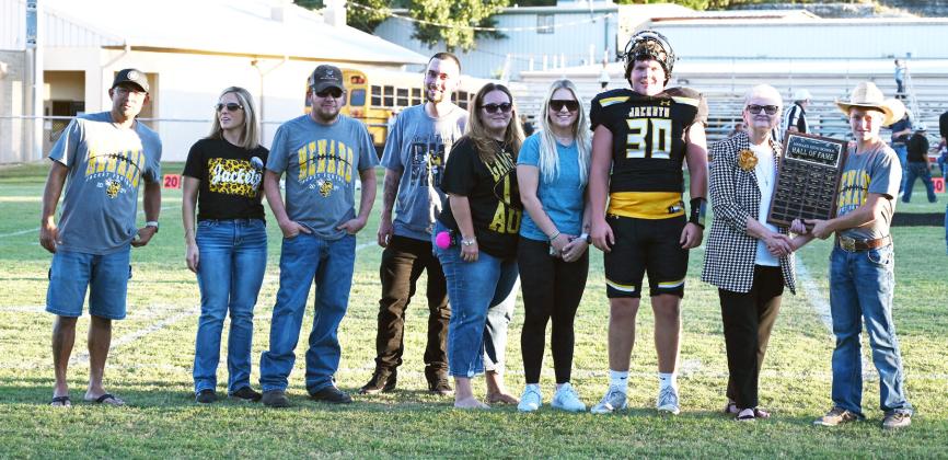 HALL OF FAME CLASS OF 2024: Renee Zimmerman, far right, was inducted into the MHS Hall of Fame last Friday. Renee is currently a practicing Family Nurse Practitioner (FNP) at Frontera Clinic in Menard. Pictured above are family members Daniel Garza, Kayla Wagner, Tyler Wagner, Wesley Wagner, Heather Garza, Mackenzie Wagner, Tate Wagner, Zimmerman, and MHS student council representative Kade Bannowsky. You can read more about Renee's Menard involvement on page 8. Denisse Crisp, photo.