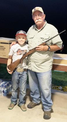 O’Dan Wright, left, poses with prize-winner James Lafosse. Lafosse won the 6.5 Grendel CZ and promptly donated it back to auction where O’Dan was able to “buy” it. TMN photo.
