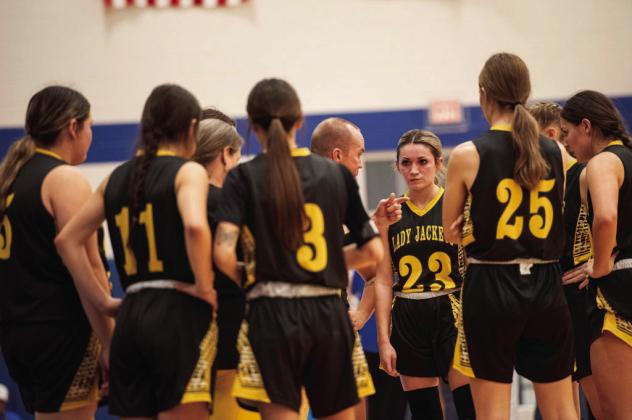 Coach Grant Gooch rallies the troops.