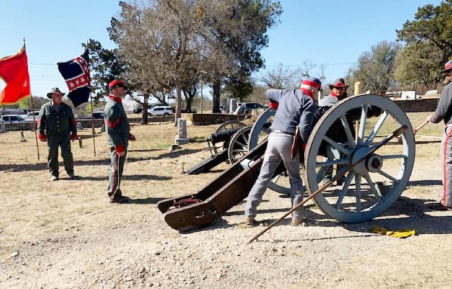 Loading the cannon are Gary Bates, Buck Bostick, Danny Masters, and Wayne Carlile. The 6-pound cannon fired during the Confederate Soldier recognition at Pioner Rest Cemetery was originally used in the 1960 movie “The Alamo.” Courtesy photo.