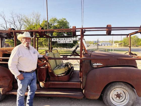 Richard Garcia stands next to his grandfather's sheep shearing rig from the 50s. He happened upon the vehicle on a Facebook post and was able to purchase and return it to Menard County. It now resides at its permanent resting place at Menardville Museum, where others can appreciate its history. Photo courtesy Menard County Historical Commission.