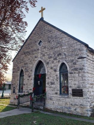 The tidy little historic Catholic Church on the corner of Bevans and Canal Streets is looking festive for the Christmas holidays. Menard’s Sacred Heart Catholic Church is currently in the organizing and fundraising stages to ultimately properly renovate the building, which is currently not in daily use. The Menard News will keep you updated as the church improvement progresses. TMN photo.