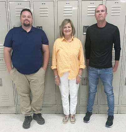 MENARD ELEMENTARY AND JH WELCOME NEW TEACHERS Ryan McCaffery, left, will teach PE; Gwenda Neal, center, is coming out of retirement to take on grades 1 and 2. Right is Ryan Gooch- JH History and MHS girls basketball coach. Happy to have you all; have a great year!