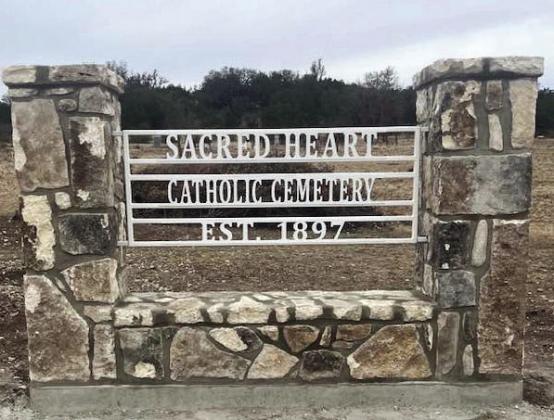 The new sign denoting the old Catholic church cemetery on Cleo Road may be the first permanent identification in the cemetery's 128 years. Courtesy photo.