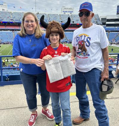 Benny Fred and Cordelia Kothmann recently took grandson George Corbin, center, to a Buffalo Bills football game in New York. George’s mom Valera (Kothmann) Corbin also attended, and of course they dutifully brought along a copy of The Menard News. Cordelia reports TMN was also taken internationally into Canada; however, they were having so much fun they forgot to get a photo. Thanks for including us, Kothmanns and Corbins!