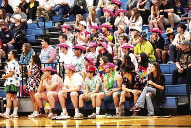 MENARD EXTRACURRICULARS are rarely without a spirited cheering section, as seen last week at the Lady Jackets' final game of the season. Sandy Kothmann, photo.