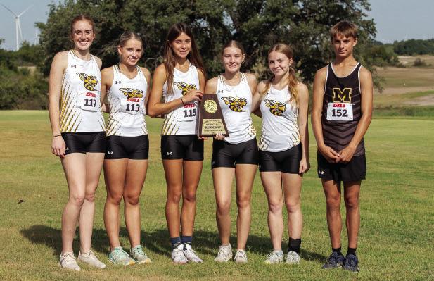 DISTRICT RUNNERS UP- The varsity Lady Jackets advance as a team to the regional meet next week. Pictured left to right: Makenzie Wright, Taytum Chambless, Danni Ruiz, Kaitlyn Whitaker, Isabelle Devine, and lone Yellowjacket Jaegar Leonard. Nora Davis, photo.