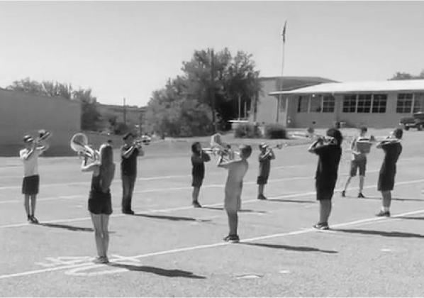 HORNS ARE UP! The Menard Yellowjacket Band has braved the 100 plus temps along with the sports athletes to prepare for the upcoming year. The band is under the direction of Ms. Rebekah Cook in her first year at Menard.