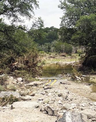 ABOVE- The center stripe of Little Saline Creek crossing on FM 1221 is now in the creek bed. TMN, photo.