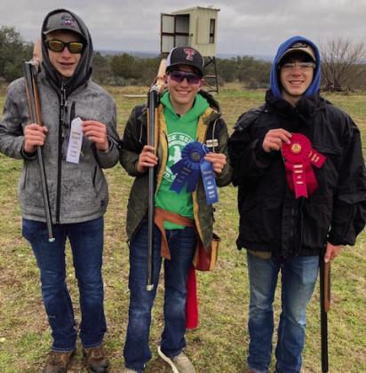 Three scatter shooters participate in Menard 4-H Shotgun Sports County Club shoot