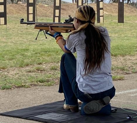 SHARP SHOOTER- Intermediate shooter Mia Rose Estrada in the kneeling position at last week’s 4H District 7 Smallbore Match in Brady. Courtesy photo.