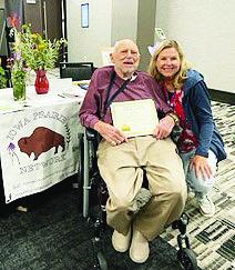 Menard native Dr. Jake Landers, pictured above with daughter Amy Ness, was recognized with the North American Prairie Lifetime Achievement Award. Courtesy Photo.