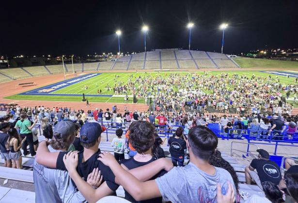 FIELDS OF FAITH- About 40 Menard student athletes attended the annual Fields of Faith gathering in San Angelo last week. Several speakers and a worship band gave thousands of Concho Valley student athletes the opportunity to come together for a night of fellowship and worship underneath the stadium lights. Tyler Wright, photo.