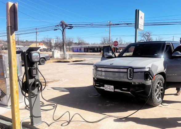 RECHARGE IN MENARD- Two LibertyPlugins EV charging stations (pictured above) are installed on the north side of The Menard Station. Each charging station is equipped with a QR code for seamless connection to the charging software and easy to understand instructions for patrons. TMN PHOTO.