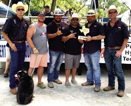 WINNER, WINNER BBQ DINNER- The Los Borrachos team from Menard earned Grand Champion Overall at the June 10 Jim Bowie Day Cook-off. Their placings included a winning Bloody Mary and a second place ribs entry. Complete results can be found listed below. Pictured above is the Los Borrachos accepting their all-around trophy. Left to right: Lee Thornhill, (Chamber Director), Corey Owens, Esai Saiz, Jeremiah Guerrero, Johnny Saiz, Clint Roberson (Chamber Director). TMN photo.