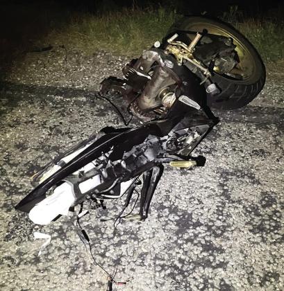 Not much remains of the front half of the performance/ sport bike that collided head on with a truck and trailer last Friday, April 11 north of Menard on US 83. The unidentifi ed male driver was pronounced dead at the scene. Photo courtesy MCSO.