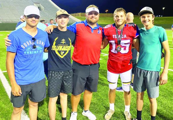 PRIDE NEVER DIES- Left to right is former Yellowjacket Kolton Whitaker, Yellowjacket Logan Powell, coach Bryson Oliver, Joel Guerrero, and former Yellowjacket Roy Brown to celebrate Oliver and Guerrero after the TSMCA All-Star football game on Saturday, July 1. Courtesy photo.