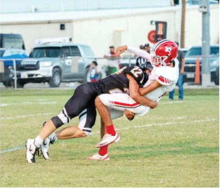 BEAST MODE was sophomore Wesley Compton's setting last Thursday night in the Jackets' 68-6 smattering of the Rocksprings Angoras. Compton had eight tackles including 3.5 tackles for loss and a sack. See more on last week's game on page 9. Menard hosts Bronte this Friday night for Homecoming. Nora Davis, photo.