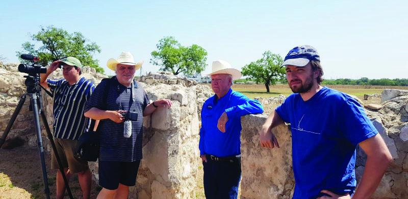 ON THE BIG SCREEN- Award-winning Director Jose Lopez Linares (left center) and Presidio Restoration Corporation president Terrell Kelley (right center) take a break with the film crew on a hot Texas summer day. The crew was in the area to gather footage of the Presidio de San Saba for an upcoming documentary on 'important but lesser-known' Spanish Colonial sites. Courtesy photo.