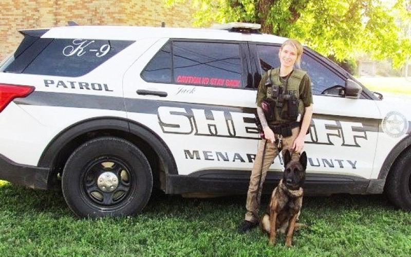 MENARD SHERIFF'S DEPUTY BREE MOORE and her K-9, Jack, were called in following an arrest of a local man last Friday. Jack gave a positive alert after sniffing the suspect vehicle, which led to the seizure of approximately 5 grams of a crystal substance that field-tested positive for methamphetamine, along with packaging materials and digital scales. Courtesy photo.