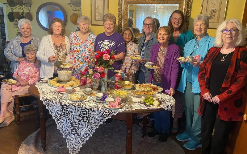 The Garden Club recently met at the home of Beverly Malcolm for a luncheon and craft project. The group created garden decor treasures out of old china pieces. Pictured left to right: Nancy Davis (seated), CeeCee Kelley, Betty Wilson, Betty Jackson, Mary Ann Medley, Beatrice Garza, Deb Brantley, JoAnn Royal, Beverly Malcolm, Linda Compton, Debbie Durst. Courtesy photo.