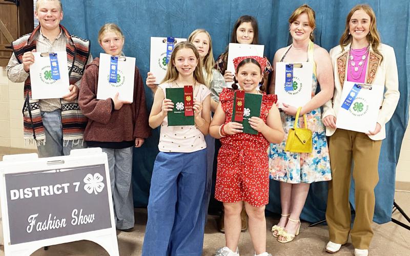 A FASHIONABLE LOT of Menard 4-H sewing participants ruled the roost at the district 7 fashion show last Wednesday. Pictured back row, left to right: Tanner Brown, Daphne Mews, Georgina Mobley, Audrey Wilkinson, Jacey Sealy, Makenzie Wright. Front row: Saydee Meadow, Ellen Hand. Photo courtesy Menard Co. 4-H.