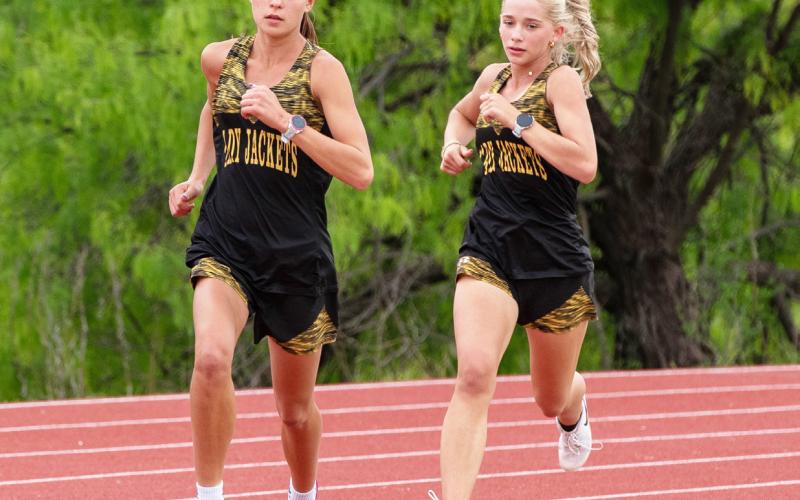 ABOVE- The consistent Lady Jacket duo of Danni Ruiz and Taytum Chambless cruising on the back stretch of one of their multiple races. In just 4 events, Ruiz and Chambless raked in 4 gold medals and 2 silver medals at the district meet.